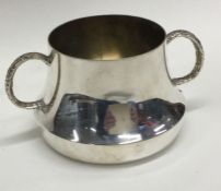 A heavy limited edition silver cream jug with text