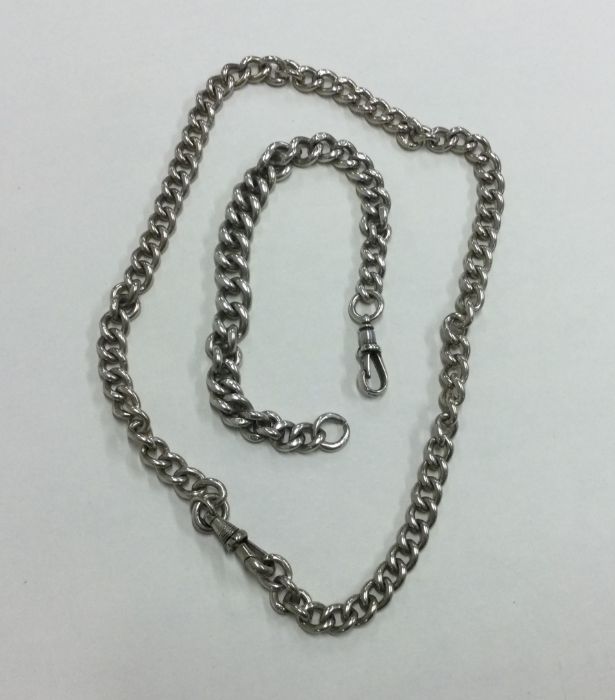 A silver curb link necklace together with a bracel