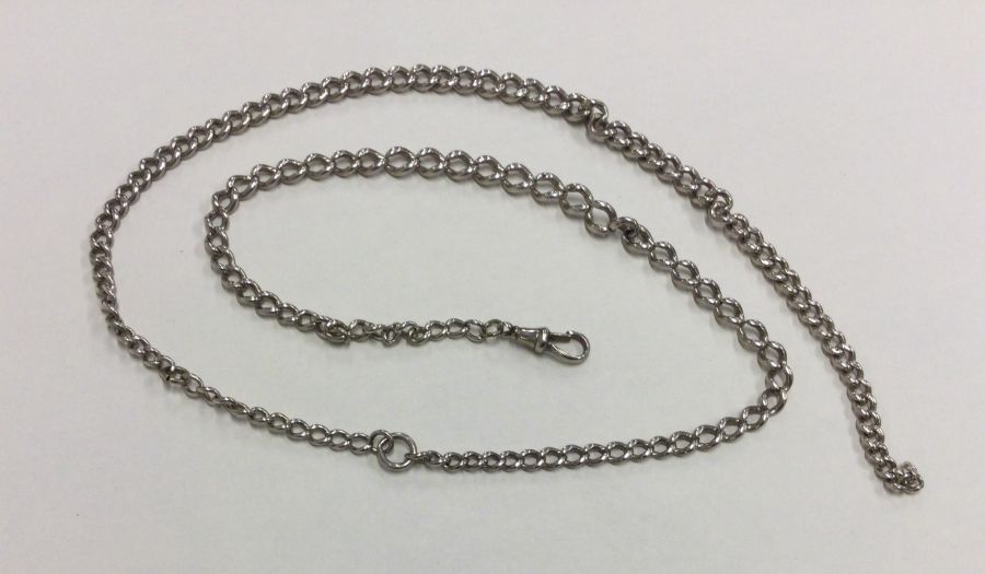 A long silver curb link watch chain. Approx. 43 gr