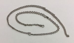 A long silver curb link watch chain. Approx. 43 gr