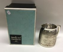 BOODLE & DUNTHORNE: A stylish silver mug of textur