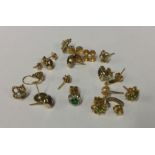 A bag containing numerous gold earrings. Approx. 1