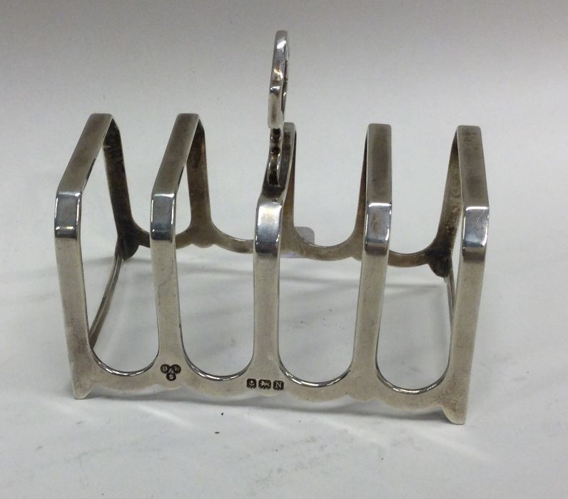 An Edwardian silver five bar toast rack. Birmingha