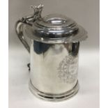 A good Britannia Standard silver lidded tankard of