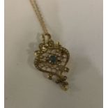 An attractive Victorian 15 carat gold pendant with