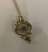 An attractive Victorian 15 carat gold pendant with