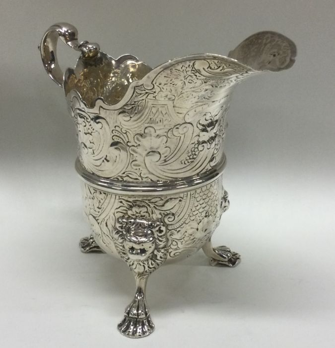 DUBLIN: A large 18th Century chased silver cream j