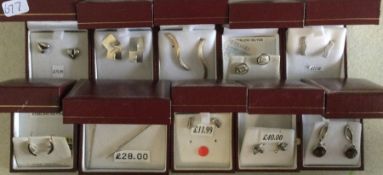 Ten pairs of silver earrings. Est. £20 - £30.