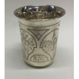 A large Russian silver tapering cup engraved with