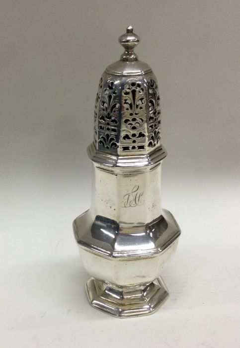 A heavy George II silver caster of octagonal form.