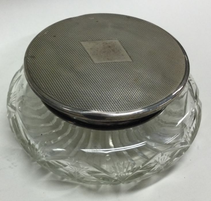 A heavy hobnail cut and silver mounted powder jar