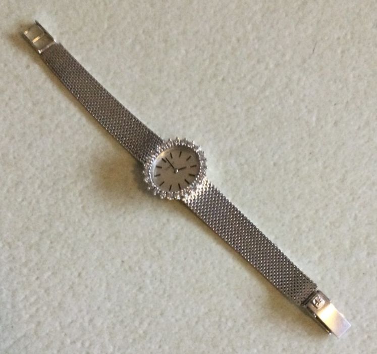 A heavy 14 carat TIssot wristwatch. Approx. 28 grams.