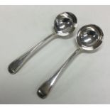 A pair of heavy silver bead edge ladles. London. B