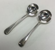 A pair of heavy silver bead edge ladles. London. B