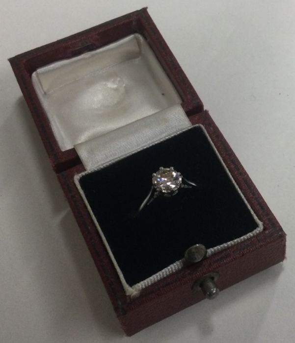 A good diamond single stone ring in 18 claw eight