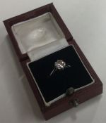 A good diamond single stone ring in 18 claw eight