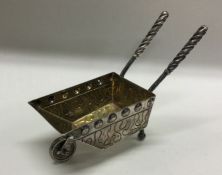 A novelty silver model of a wheelbarrow of Arts an