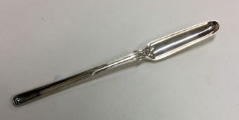 A heavy silver double-ended marrow scoop with shel