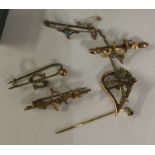 A collection of gold mounted bar brooches. Approx.