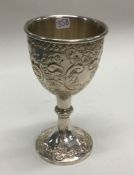 A fine quality Edwardian silver goblet profusely d