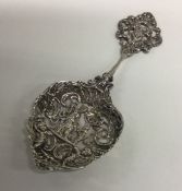 CHESTER: A heavy cast silver preserve spoon decora