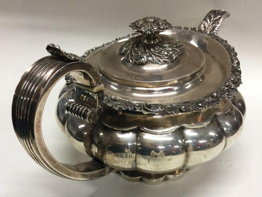A good Georgian silver teapot attractively cast wi - Image 3 of 3