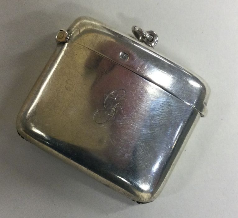 A heavy silver hinged top vesta case. Sheffield. B