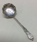 A pierced silver ladle with rope twist stem. Birmi