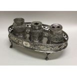 An attractive lady's three bottle silver inkstand