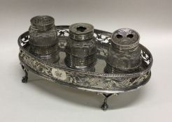 An attractive lady's three bottle silver inkstand