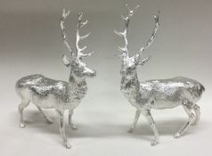 A good pair of heavy cast silver stags in standing