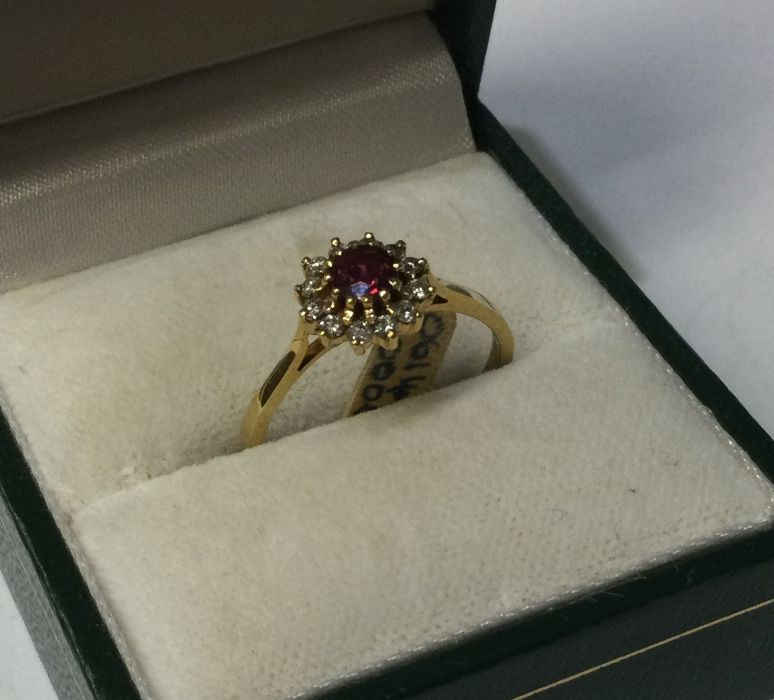 An 18 carat gold ruby and diamond cluster ring in - Image 2 of 2