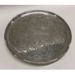A large George III silver salver decorated with re