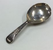 A Georgian silver bright cut caddy spoon with engr