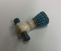 A good Antique tapering ivory seal with turquoise