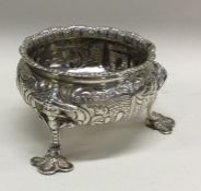 A fine cast Georgian silver salt of chinoiserie de