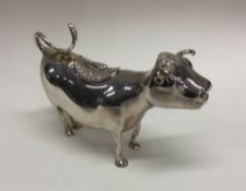 A 19th Century silver cow creamer of typical form.