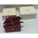 OMEGA: Three Omega wristwatch boxes. Est. £30 - £4