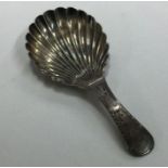 A Georgian silver caddy spoon with bright cut deco