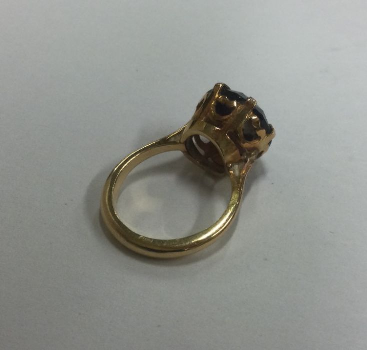 An 18 carat gold amethyst single stone ring in cla - Image 2 of 2