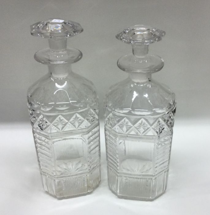 A good pair of Antique silver decanters with lift-