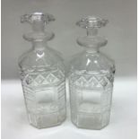 A good pair of Antique silver decanters with lift-