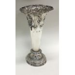 A good chased silver spill vase decorated with scr