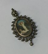 An attractive Antique oval miniature depicting chi
