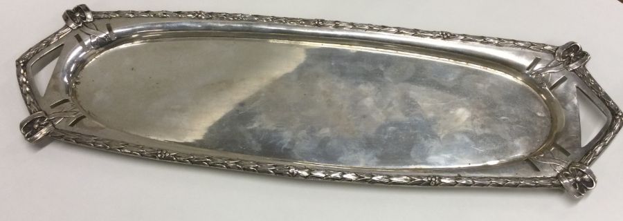 A heavy German silver sandwich tray with bell deco