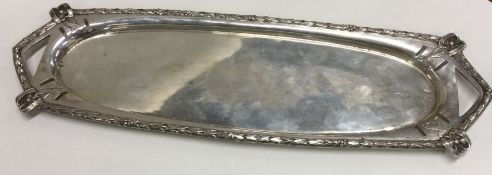 A heavy German silver sandwich tray with bell deco