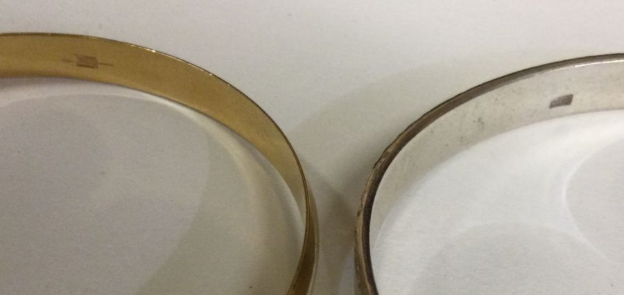 A heavy silver bangle, (approx. 15 grams), togethe - Image 2 of 2