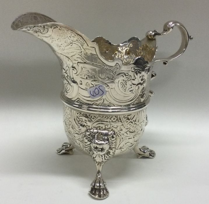 DUBLIN: A large 18th Century chased silver cream j - Image 2 of 3