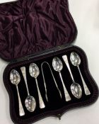 A cased set of six silver teaspoons together with
