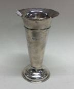 A tapering silver spill vase with crimped rim. Lon